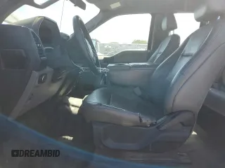 2018 Ford F-150 XL with VIN 1FTEX1EB2JKF61257, listed as a Copart auction lot 53674615 with 161,021 mi miles and Salvage title. Bid and sale history available at DreamBid. Image 7.