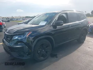 2022 Honda Pilot Special Edition with VIN 5FNYF5H25NB026414, listed as a IAAI auction lot 42590493 with 26,600 mi miles and . Bid and sale history available at DreamBid. Image 2.