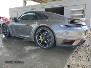 2022 Porsche 911 Turbo S z VIN WP0AD2A91NS255589, wystawiony jako Copart lot #60695644 z przebiegiem 6 562 mil mil oraz Nie do naprawy • Non repairable. Historia ofert i sprzedaży dostępna na DreamBid. Obrazek 2.