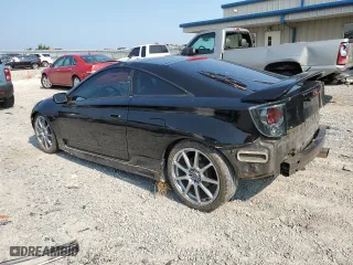 2002 Toyota Celica GTS with VIN JTDDY32T220061761, listed as a Copart auction lot 65624684 with 159,060 mi miles and Salvage Title. Bid and sale history available at carsss.com. Image 2.