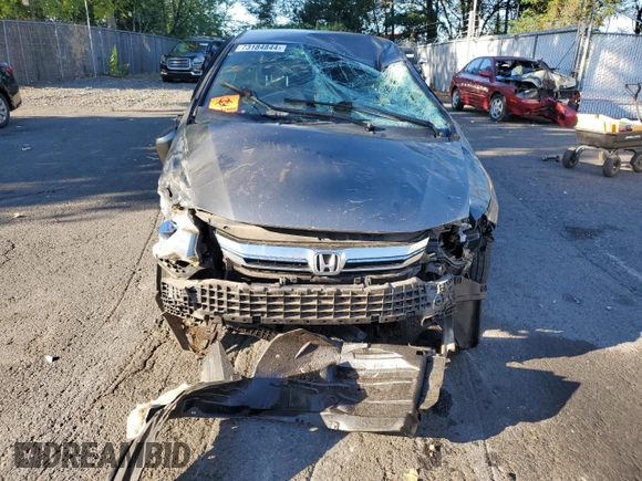 2012 Honda Insight EX z VIN JHMZE2H72CS006248, wystawiony jako Copart lot #73184844 z przebiegiem Nie podano mil oraz Szkoda całkowita • Salvage title. Historia ofert i sprzedaży dostępna na DreamBid. Obrazek 5.