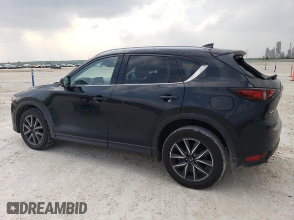2017 Mazda CX-5 Grand Touring with VIN JM3KFADL0H0217505, listed as a Copart auction lot 50470735 with 176,878 mi miles and Salvage Title. Bid and sale history available at carsss.com. Image 2.