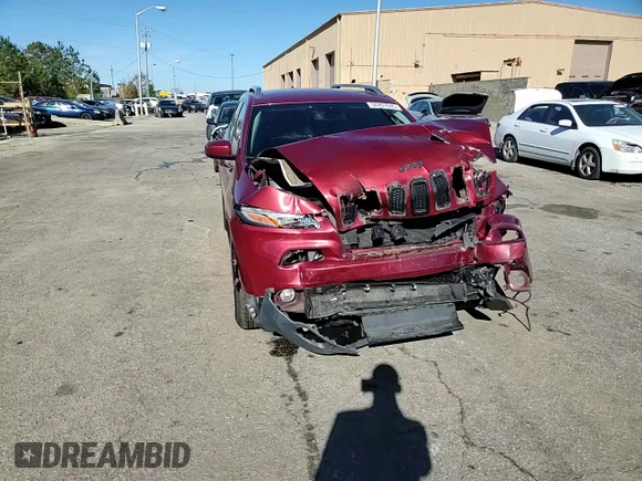 2015 Jeep Cherokee Latitude with VIN 1C4PJLCB5FW695592, listed as a Copart auction lot 50297695 with 108,091 mi miles and Salvage Title. Bid and sale history available at DreamBid. Image 11.