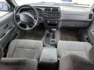 2000 Nissan Frontier XE with VIN 1N6ED27T3YC343320, listed as a Copart auction lot 64883025 with 168,047 mi miles and Clean title. Bid and sale history available at DreamBid. Image 8.