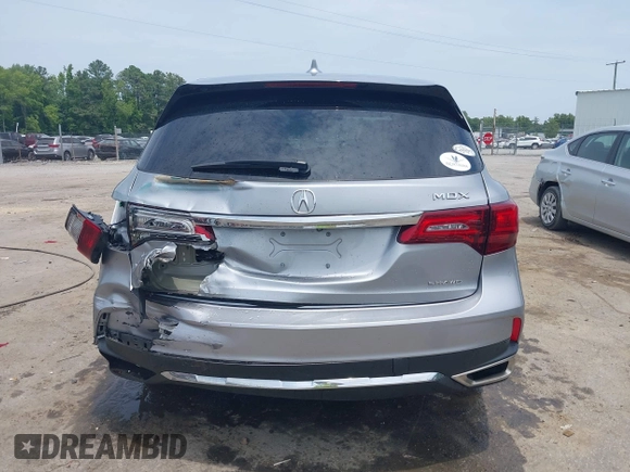 2020 Acura MDX with VIN 5J8YD4H3XLL003859, listed as a IAAI auction lot 42502948 with 66,839 mi miles and . Bid and sale history available at DreamBid. Image 16.