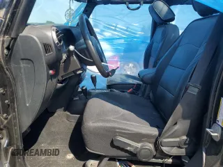 2015 Jeep Wrangler Unlimited Freedom with VIN 1C4BJWDG8FL689194, listed as a Copart auction lot 58016385 with 108,026 mi miles and Salvage title. Bid and sale history available at DreamBid. Image 7.