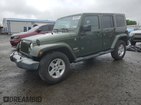2007 Jeep Wrangler Unlimited Sahara z VIN 1J4GA59127L106988, wystawiony jako Copart lot #59750975 z przebiegiem 154 233 mil mil oraz Czysty tytuł • Clean title. Historia ofert i sprzedaży dostępna na DreamBid. Obrazek 1.