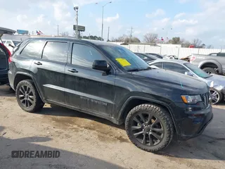 2017 Jeep Grand Cherokee Altitude with VIN 1C4RJEAG0HC880673, listed as a IAAI auction lot 41511317 with 141,769 mi miles and . Bid and sale history available at DreamBid. Image 1.