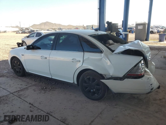2008 Ford Taurus SEL with VIN 1FAHP24WX8G154717, listed as a Copart auction lot 71194794 with 217,119 mi miles and Salvage Title. Bid and sale history available at carsss.com. Image 2.