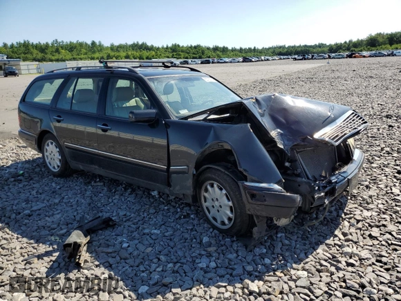 1999 Mercedes-Benz E-Class with VIN WDBJH82F8XX020574, listed as a Copart auction lot 63730124 with 201,401 mi miles and Salvage Title. Bid and sale history available at carsss.com. Image 4.