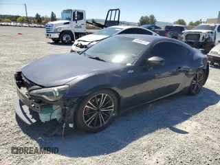 2014 Scion FR-S with VIN JF1ZNAA15E9704418, listed as a Copart auction lot 50098275 with 100,674 mi miles and Salvage Title. Bid and sale history available at DreamBid. Image 1.