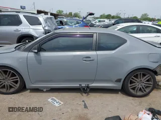 2013 Scion tC with VIN JTKJF5C7XD3046764, listed as a IAAI auction lot 41881930 with 87,701 mi miles. Bid and sale history available at carsss.com. Image 14.