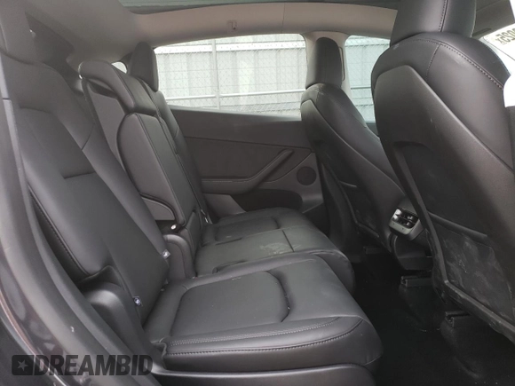 2024 Tesla Model Y Long Range with VIN 7SAYGAEE5RF038446, listed as a Copart auction lot 48868025 with 10,410 mi miles and Salvage Title. Bid and sale history available at DreamBid. Image 11.