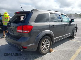 2017 Dodge Journey SXT with VIN 3C4PDCBG0HT518364, listed as a IAAI auction lot 42320159 with 219,061 mi miles and . Bid and sale history available at DreamBid. Image 4.