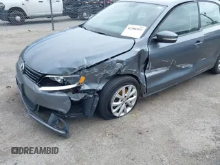 2011 Volkswagen Jetta SE with VIN 3VWDZ7AJ0BM355626, listed as a IAAI auction lot 42306937 with 144,572 mi miles and . Bid and sale history available at DreamBid. Image 6.