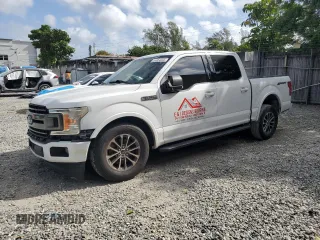 2018 Ford F-150 XL with VIN 1FTEW1CP8JFB02261, listed as a Copart auction lot 51264065 with 164,757 mi miles and Salvage Title. Bid and sale history available at carsss.com. Image 1.