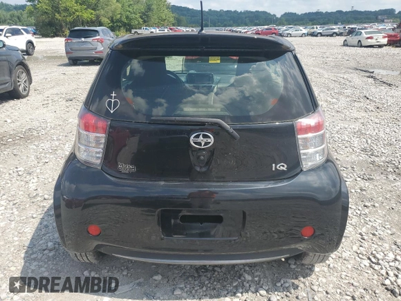 2014 Scion iQ with VIN JTNJJXB07EJ028558, listed as a Copart auction lot 64745345 with 112,221 mi miles and Clean title. Bid and sale history available at DreamBid. Image 6.