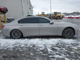 2011 BMW 7 Series 740Li with VIN WBAKB4C54BC574892, listed as a IAAI auction lot 41165432 with 115,489 mi miles. Bid and sale history available at carsss.com. Image 12.