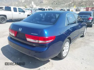 2003 Honda Accord LX with VIN JHMCM56353C063225, listed as a IAAI auction lot 42432611 with 202,916 mi miles and . Bid and sale history available at DreamBid. Image 4.