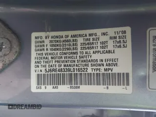 2009 Honda CR-V LX with VIN 5J6RE48339L016522, listed as a IAAI auction lot 40783609 with 209,891 mi miles. Bid and sale history available at carsss.com. Image 9.
