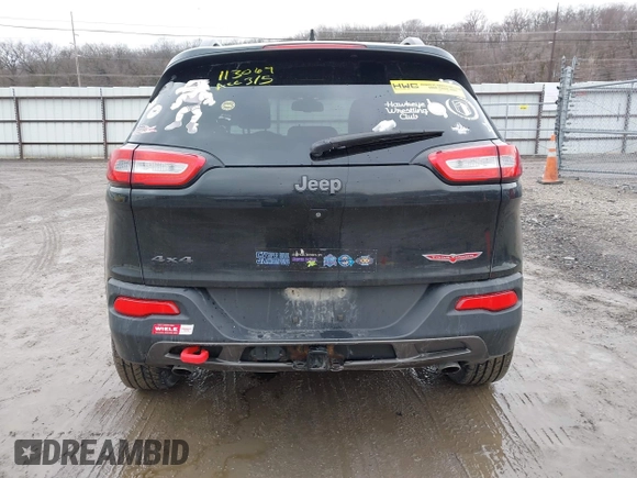 2016 Jeep Cherokee Trailhawk with VIN 1C4PJMBS6GW113069, listed as a IAAI auction lot 41757725 with 125,029 mi miles. Bid and sale history available at carsss.com. Image 17.