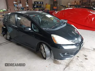 2009 Honda Fit Sport z VIN JHMGE88489S003721, wystawiony jako IAAI lot #42320571 z przebiegiem 162 852 mil mil oraz . Historia ofert i sprzedaży dostępna na DreamBid. Obrazek 1.