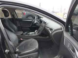 2013 Ford Fusion Titanium with VIN 3FA6P0D99DR130031, listed as a IAAI auction lot 41885596 with 174,687 mi miles. Bid and sale history available at carsss.com. Image 5.