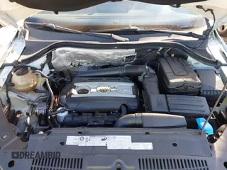 2012 Volkswagen Tiguan SE with VIN WVGAV7AX9CW590965, listed as a IAAI auction lot 41852407 with 153,953 mi miles and . Bid and sale history available at DreamBid. Image 10.