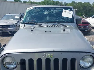 2014 Jeep Wrangler Sport with VIN 1C4AJWAG6EL192448, listed as a IAAI auction lot 42479738 with 44,848 mi miles and . Bid and sale history available at DreamBid. Image 12.