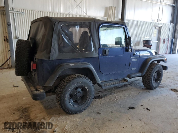 2002 Jeep Wrangler Sport with VIN 1J4FA49S82P713459, listed as a Copart auction lot 52745955 with 173,297 mi miles and Salvage Title. Bid and sale history available at carsss.com. Image 3.