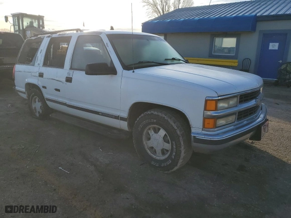 1999 Chevrolet Tahoe with VIN 1GNEC13RXXJ519095, listed as a Copart auction lot 43254645 with 176,861 mi miles and Salvage Title. Bid and sale history available at carsss.com. Image 4.