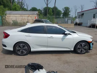 2016 Honda Civic EX-L z VIN 2HGFC1F79GH637326, wystawiony jako IAAI lot #42438274 z przebiegiem 215 846 mil mil oraz . Historia ofert i sprzedaży dostępna na DreamBid. Obrazek 14.