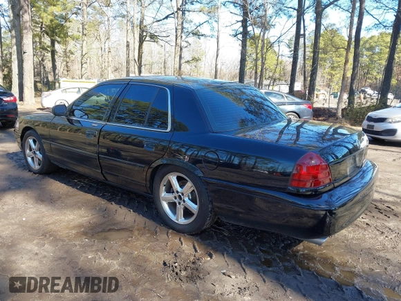 2003 Mercury Marauder with VIN 2MEHM75V33X628952, listed as a IAAI auction lot 41534323 with 92,228 mi miles. Bid and sale history available at carsss.com. Image 3.