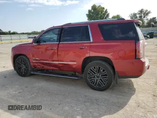 2015 GMC Yukon Denali with VIN 1GKS2CKJ6FR136152, listed as a Copart auction lot 76967664 with 137,208 mi miles and Salvage Title. Bid and sale history available at carsss.com. Image 2.