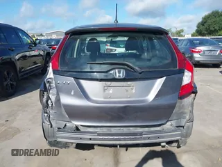 2020 Honda Fit LX with VIN 3HGGK5H46LM725764, listed as a IAAI auction lot 42499144 with 79,758 mi miles and . Bid and sale history available at DreamBid. Image 6.