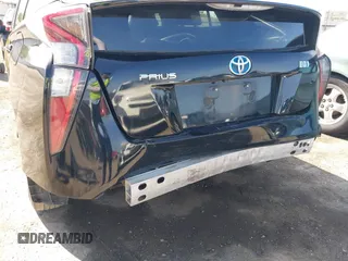 2016 Toyota Prius Two with VIN JTDKBRFU9G3021083, listed as a IAAI auction lot 41986733 with 117,227 mi miles and . Bid and sale history available at DreamBid. Image 21.