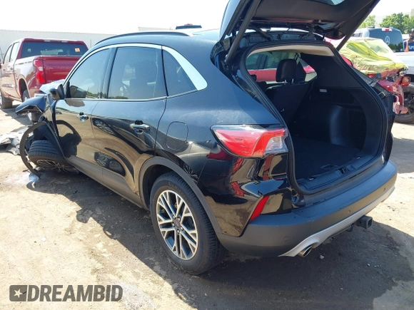 2020 Ford Escape SEL z VIN 1FMCU9H91LUB86584, wystawiony jako IAAI lot #42268456 z przebiegiem 94 753 mil mil oraz . Historia ofert i sprzedaży dostępna na DreamBid. Obrazek 3.
