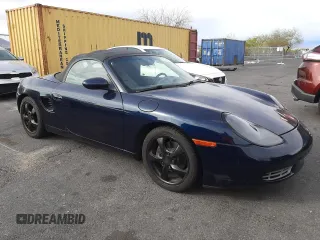 2000 Porsche Boxster z VIN WP0CA2981YU626756, wystawiony jako Copart lot #51706035 z przebiegiem 117 369 mil mil oraz Czysty tytuł • Clean title. Historia ofert i sprzedaży dostępna na DreamBid. Obrazek 4.
