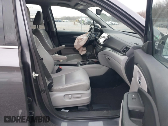 2017 Honda Pilot EX-L with VIN 5FNYF6H59HB029160, listed as a IAAI auction lot 41557192 with 157,153 mi miles and . Bid and sale history available at DreamBid. Image 5.