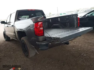 2014 Chevrolet Silverado 1500 LT with VIN 3GCUKREH6EG381743, listed as a IAAI auction lot 41583823 with 141,671 mi miles. Bid and sale history available at carsss.com. Image 3.