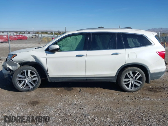 2017 Honda Pilot Elite with VIN 5FNYF6H02HB042160, listed as a IAAI auction lot 40893685 with Not Provided miles and . Bid and sale history available at DreamBid. Image 13.
