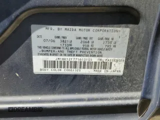 2007 Mazda 3 i Touring with VIN JM1BK12F771613103, listed as a Copart auction lot 52523994 with 259,387 mi miles and Salvage Title. Bid and sale history available at DreamBid. Image 12.