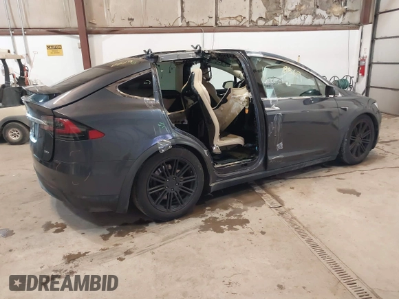 2016 Tesla Model X 70D with VIN 5YJXCBE2XGF025303, listed as a IAAI auction lot 41558869 with 77,793 mi miles and . Bid and sale history available at DreamBid. Image 4.