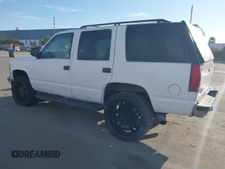1997 GMC Yukon with VIN 1GKEK13R9VJ741768, listed as a IAAI auction lot 41692027 with 200,681 mi miles. Bid and sale history available at carsss.com. Image 3.