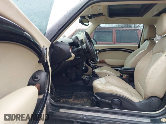 2011 MINI Hardtop S with VIN WMWSV3C57BTY11344, listed as a IAAI auction lot 41728349 with 84,242 mi miles and . Bid and sale history available at DreamBid. Image 5.
