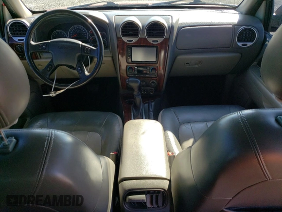 2004 GMC Envoy SLT with VIN 1GKDT13S242417226, listed as a Copart auction lot 46111865 with 375,450 mi miles and Salvage Title. Bid and sale history available at DreamBid. Image 8.