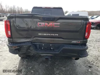 2023 GMC Sierra 2500HD AT4 with VIN 1GT49PE70PF187396, listed as a Copart auction lot 43544445 with 27,432 mi miles and Salvage Title. Bid and sale history available at carsss.com. Image 6.