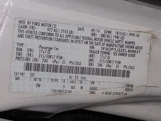 2014 Ford Focus Titanium with VIN 1FADP3J22EL406937, listed as a IAAI auction lot 41717666 with 172,646 mi miles. Bid and sale history available at carsss.com. Image 9.