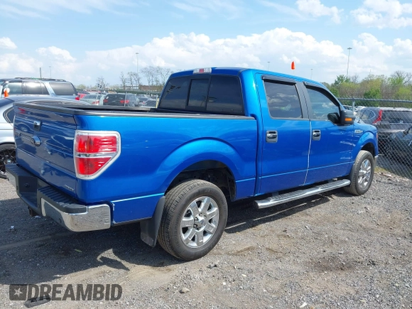 2014 Ford F-150 XL with VIN 1FTFW1CF4EKF14279, listed as a IAAI auction lot 42006454 with 104,648 mi miles. Bid and sale history available at carsss.com. Image 13.
