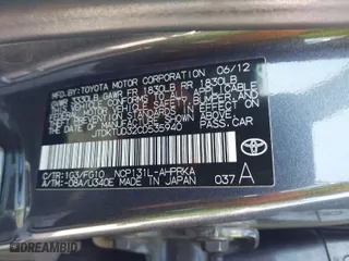 2012 Toyota Yaris L with VIN JTDKTUD32CD535940, listed as a IAAI auction lot 41767488 with 139,972 mi miles. Bid and sale history available at carsss.com. Image 9.
